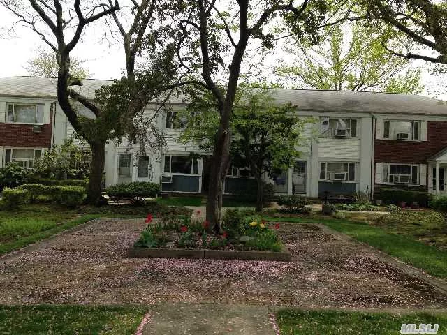 2 Bedroom Duplex 1.5 Baths In Gorgeous Tree Lined Courtyard. Walk To Bay Terrace Shopping Center, Express Bus, House Of Worship, Library, Bay Terrace Pool Club, Elementary/Middle School. Apartment Is In Center Of Courtyard.