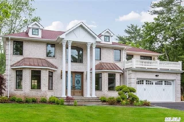 Magnificent Custom Built Brick Colonial Located In The Heart Of Roslyn Country Club. Expert Craftsmanship And Incredible Architectural Details Throughout. Exquisite Moldings, Gourmet Kitchen With Top-Of-The-Line Appliances, Lower Level Finished With Exterior Access.