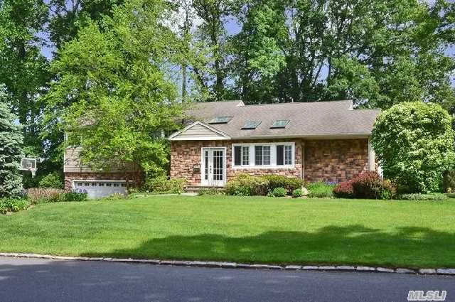 Center Hall Expanded Ranch, Updated Eik, Cathedral Ceiling, Hi-Hats, H/W Floors, New Windows, Doors, Terra Cotta And Clapboard. Cement Patio Off Huge Livingroom With Fireplace Overlooking Property Lover&rsquo;s Delite. Nice Front Door, Access To East Hills Park . Septic System