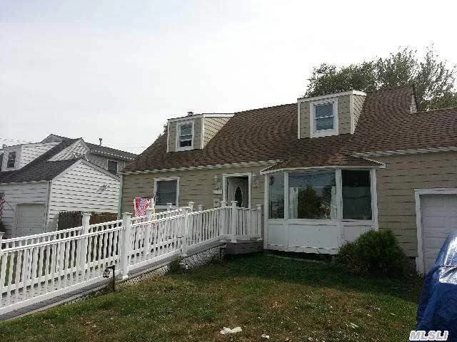 Spacious 5 Bedroom, 2.5 Bath Expanded Cape With Over-Sized Property. New Room In Basement With Ose. 18 X 24 Kitchen.