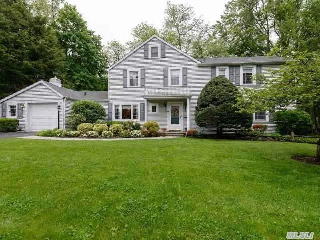 Classic 4 Bedroom, 2.5 Bath Colonial Situated On Almost 1/3 Acre Of Beautifully Landscaped Property Featuring Quality Detailing And Craftsmanship Though Out. Interior Living Space Flows Seamlessly To Outdoor Private Rear Yard With Slate Patio.