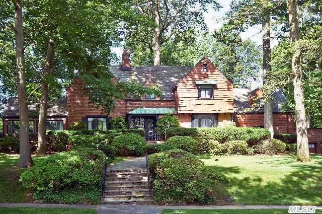 This Sprawling Elegant French Tudor Home Stands On A Quiet Cul-De-Sac In Prestigious University Gardens. The .77 Acre Park-Like Property Has 200 Ft Frontage And Extends 170 Ft Deep. Perched On A Stately Elevation, The 12-Room House Is Set Back 60 Ft From The Street And Spans 125 Ft Laterally Creating Immense Curb Appeal. Sub-Division Possible.