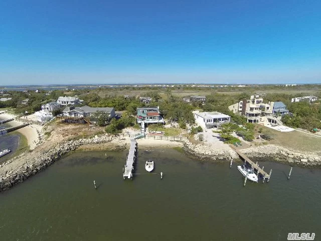 Enjoy Sunrises & Sunsets From The Upper Deck While Looking Out Over Your Pristine Sandy Beach To The Fire Island Inlet & Beyond. Protected By Jetties On Either Side & Full Bulk Heading With Your Own Deep Water Dock Provides Great Fishing & Recreational Opportunities. Hardwood Floors Throughout. A Boater&rsquo;s Paradise 50 Mins From Nyc & Minutes To Babylon Train Station.