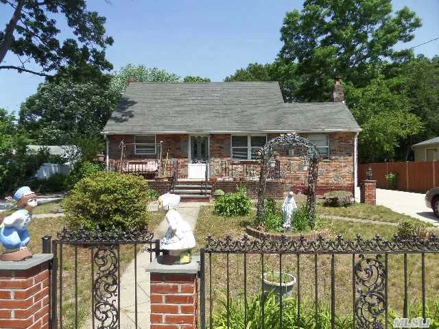 Huge Expanded Cape Offering 4 Bedrooms, 2 Full Baths, 1 Half Bath, Lr, Fdr, Den, 2 Fireplaces, Detached Garage, Intrior And Exterior Entrance To Basement, Needs Tlc To Make It Your Own. Great Home! This Is An Estate Sale. Sold As Is With No Representations. 2 Family With Proper Permit.