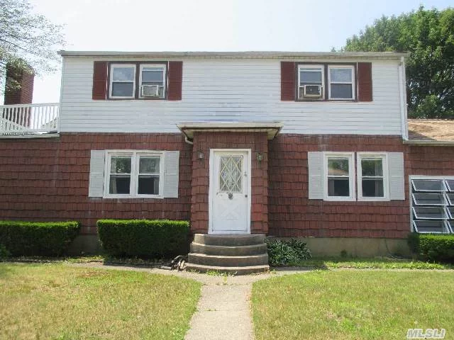 Full Dormered Colonial. Quiet Location Convenient Shops, School, Parkway, Lirr. House Sold As Is With Great Potential. Hot Water Heater 1 Yr, Roof @ 5Yrs. Huge Master Bedroom With 2 Closets + Walk-In-Closet & Entry To Deck. Den With Brick Fp. Possible 4th Br. Hardwood Fl 1st & Some Of 2nd Fl. Enclosed Breezeway/Porch. Make It Your Own!