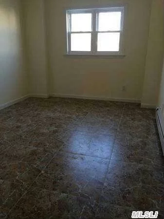 Freshly Painted Spacious Semi Detached Triplex. Washer/Dryer Hook Up Included. Parking Garage Included! School District 26. Convenient To Transportation And Shopping!