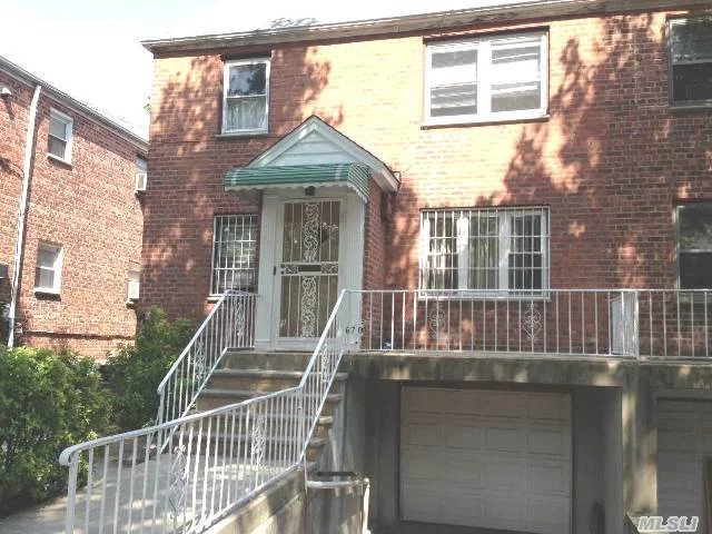 Lovingly Maintained Sd Colonial On 29X120 Property, This Sd Solid Brick 2 Family Has 6 Rooms Over 6 Rooms, 3 Bedrooms 1.5 Baths On Each Floor Hardwood Floors Throughout. Conveniently Located To Shopping, Buses, Ps173, L I Expy. And G C Pky