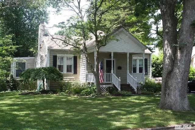 Very Charming And Spacious 3 Bedroom Traditional Home In Heart Of Beautiful Brightwaters Village. Classic Features Throughout Including Hardwood Floors, Arched Entryways, Rocking Chair Front Porch, Etc... Two Car Detached Garage With Unique Artist&rsquo;s Studio/Home Office With Fireplace. Large Cedar Deck Overlooking Private Rear Yard. Updated Kitchen, Bath And Windows.