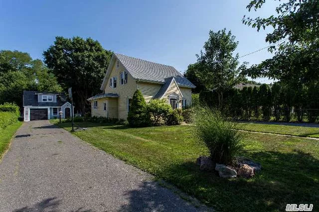 Greenport Investment Property Offering Two Separate Residences On One Lot. This Classic Farmhouse Has Been Refinished With Original Character; New Roof, Rugs With Wood Floors Under, Kitchen, Baths, Interior Repainted By Design. Cottage Has A Full Kitchen, Living Room, Dining Area, Upstairs Bedroom And Full Bath, Rear Fenced Yard. All Greenport Electric And Sewer District