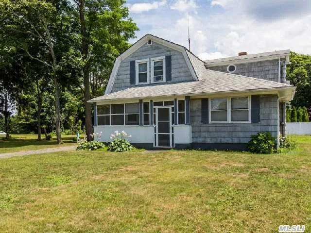 Beautiful 3-4 Bedroom Expanded Cape On A Large Corner Lot W/(2) Car Detached Garage And Additional Work Space Offers Versatile Floor Plan, Screened Rocking-Chair Front Porch, Gas Heat, Main Floor Or Basement Washer/Dryer W/Ose.