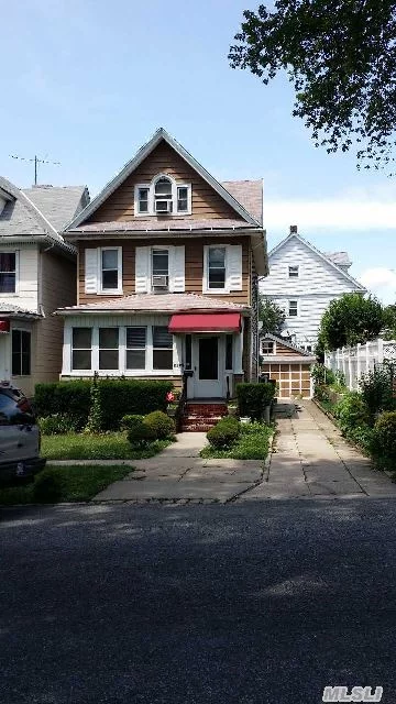 North Flushing, Prime Location, 2 Car Garage With Long Driveway.