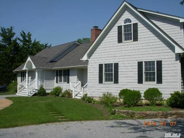 Expansive Mattituck Cape, Approx. 3476Sq Ft Of Living Space, 3Br, 3.5Ba, 1st Floor Mbr, Kit W/Granite Counters, Maple Cabinets, Prof. 6 Burner Stove, Dual Wall Ovens, Dining Area, Great Rm W/ Fplc. Open Ceiling And Loft, Living Rm W/ Fplc, Office, 1st Floor Laundry Rm, Fully Landscaped, 36X36 Det Garage W/2 Elec Overhead Doors, Side Entrance, Elec, H2O, & Oil Heat