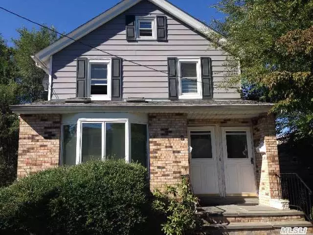 Great For Investors! Over $40, 000 Rent Roll! Waterview Apt On Top Floor! 1 Block To Beach! 1st Floor Duplex Apt. 2 Garages! Extra Large Driveway Great For Boats,  Or Contracting Equipment Storage!  3 Zone Heat,  Newer Windows,  Largest Two Family In The Area. Each Apartment Has Their Own Washer/Dryer.