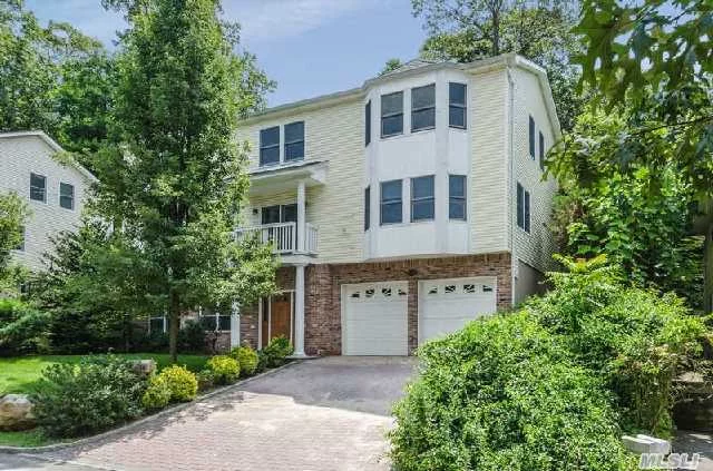 Sunlit 3 Story Home With Generous Size Rooms. The Granite Kitchen Has Stainless Steel Appliances And Access To The Yard For Convenient Outdoor Entertaining. The Finished First Floor Is Perfect For A Guest Suite Or Entertainment Room. Close To Glen Cove Marina And Sea Cliff Beach.