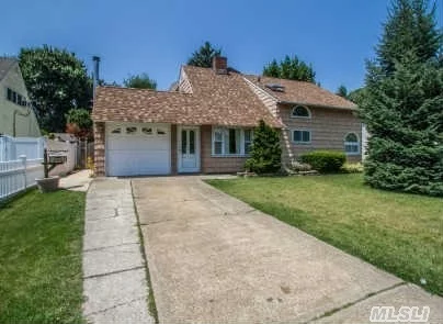 Expanded Upstairs & Downstairs. Huge Master Suite With Walk In Closet & Full Bath With Skylight. Expansive Living Room/Dining Room/Family Room. Oversized Yard Mid-Block, On Quiet Tree-Lined Street. This Is Truly A Super & Spacious Home.