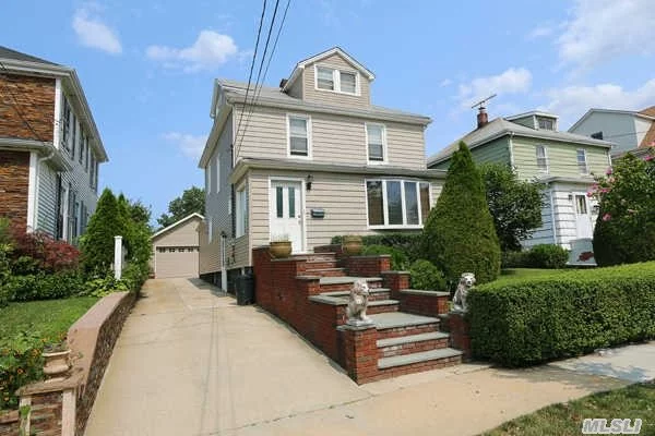 Beautiful Colonial In The East Williston School District With New Vinyl Siding, New Windows, Beautiful Hardwood Floors And Lots, Lots More. You Must See It!!