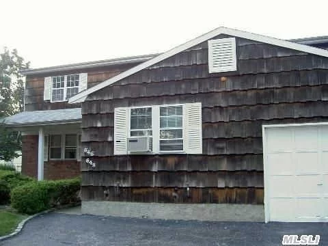 Sunny And Spacious! Legal Duplex, Hardwood Floors, Driveway Parking, Washer And Dryer Included, Vacant