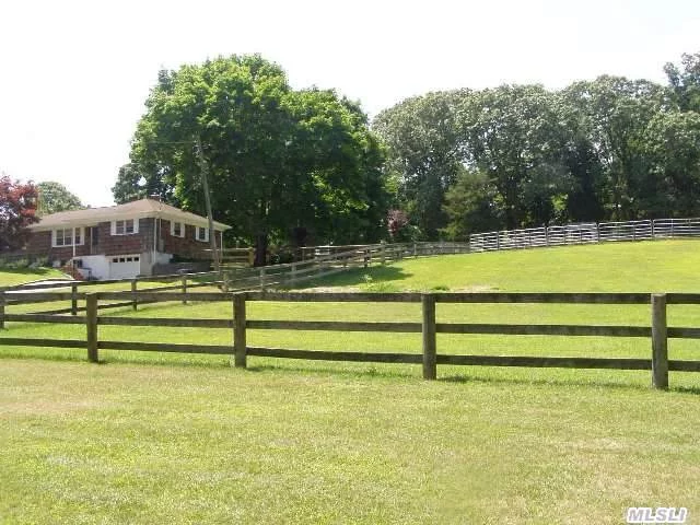 Plenty Of Privacy Here, 2 Acres Of Pastures Fenced For Horses, Shed, Dog Kennels, 4 Bedroom Home With Living Room, Den, Fireplace, Office , Kitchen, 2 Full Baths, Garage, Patio,  Finished Basement, And Amazing Farm Views Everywhere You Look. Short Distance To Your Deeded Beach! Take Your Horse Down For A Swim!