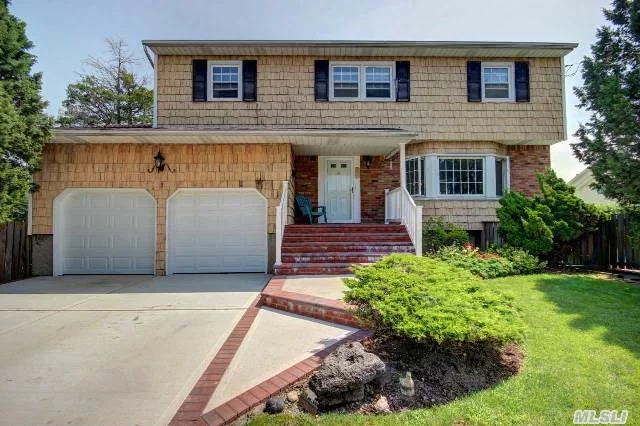 True Custom Colonial! All Large Rooms Thruout! New Walkway, Driveway And Stoop! Lg Lr, Lg Fam Rm W/Fpl! Fdr! Eik! All 4 Brs Upstairs Are Large! Newly Fin Bsmt! Full 2 Car Gar! This Is Your Chance To Get The Large Home You Are Looking For !! In Ground Pool With Southern Exposure!