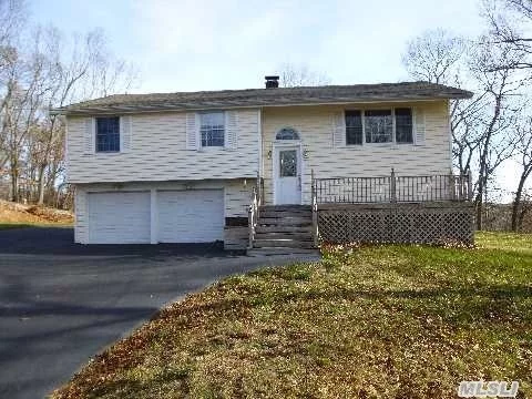 Desirable Smithtown Pines, Lovely 3 Bdrms, 2 Full Updated Baths , Large Eat In Kitchen, Cath Ceilings, Hdwd Floors, Washer/Dryer, Large 2 Car Garage, 2 Decks, Small Dog Ok With Additional Security, .75 Acre Property Mins From Hghway, Shopping And Lirr. Pines Elementary/Hauppauge Schools. Aval Immediately