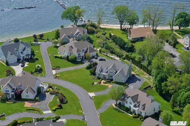 24 Hour Gated Private Waterfront Community, Water Views Of The Long Island Sound Prestigious Legends Yacht & Beach Club. Features Water Views From All The Room, 4 Bedrooms 3 Full Baths, Powder Rm, Walk Out Large Basement, Boat Slip, Marina, In Door Clay Tennis, Heated Ig Gunite Pool, Sandy Beach, World Renowned Club House, Effortless Luxury Living, You Have Arrived.