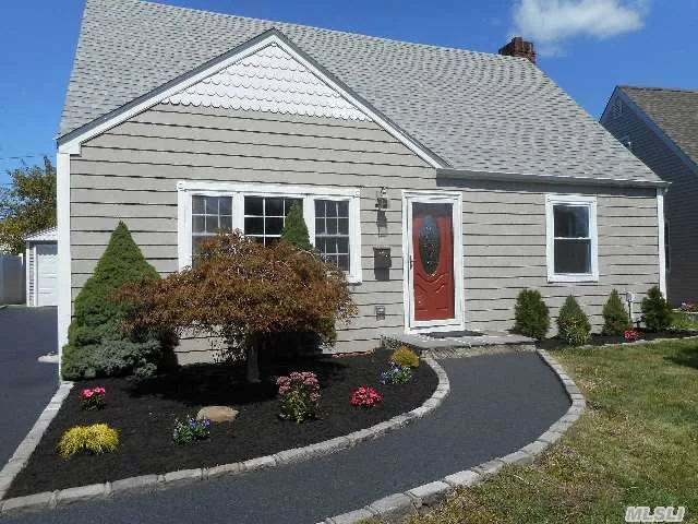 Wow, Everything Is New! Expanded And Rear Dormered Cape, 2 Baths, Granite Eik With Vaulted Ceilings. Gleaming Wood & Porcelain Floors. A Must See! It Has A Gigantic Detached Garage. Show & Sell. Mint! Mint! Mint! The Interior Of This House Is A Lot Larger Than It Looks, You Must See The Inside.