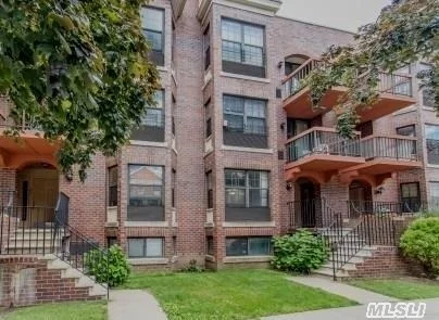 Large Spacious Two Bedroom Condo; W/Bright Finished Basement W/Separate Entrance & High Ceilings; Basement Has Family Room + 2 Extra Rooms W/ Closets (Possible 2Bedrooms) & Bath. Ample Storage & Closets. New Kitchen Appliances. New Washer & Dryer. Bus To E & F Trains, Q25, Q34, Q64, Q65, And Express Qm4 To Manhattan. Convenient To All. Must See!