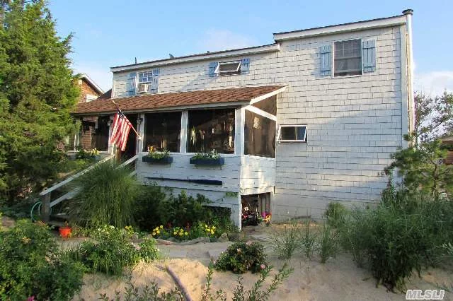 An Oak Beach Classic, This 1930&rsquo;S Elevated Beach House Features An Oversized Lot In A Private Setting W/ Garden Paths, Outdoor Entertaining Spaces, Views Of The Fire Island Inlet, Boardwalk, Beach Access & A Large Detached Art Studio. Located Only 50 Minutes From Nyc & Surrounded By Long Island&rsquo;s Best Beaches & Parklands. Enjoy Surfing, Boating, Fishing And Much More!