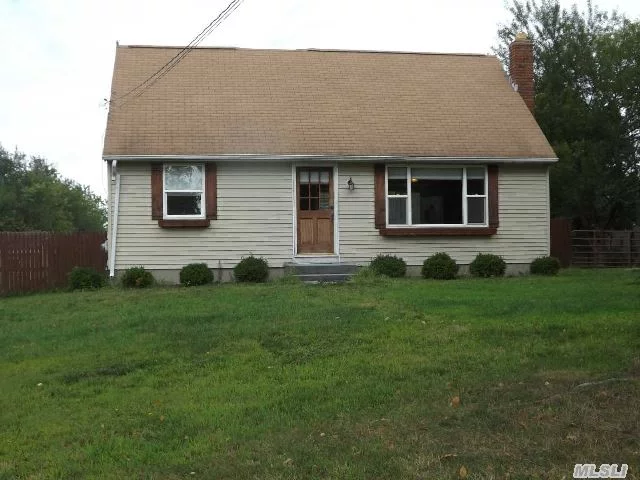 Updated 4 Bedroom Cape, New Kitchen W/Maple Cabinets, S/S Appliances And Granite Countertops,  Hardwood Floors, Updated Baths Newer Heating System, Outside Entrance From Basement. Just Shy 1 Acre Has Deck & Shed. Close To Shopping, Outlets, Wineries 2 % Peconic Tax Applies Rm Upstairs For 1/2 Bath