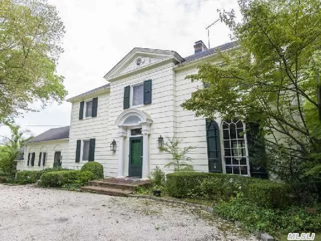 Beautiful Hewlett Neck Colonial On Quiet Tree-Lined Street. Four Bedrooms Cathedral Ceiling In Master Bedroom And 4.5 Baths. New Electric, Plumbing And Central Air. In Ground Gunite Pool On 3/4 Acre With Tennis Court. Homeowner Is Very Motivated!