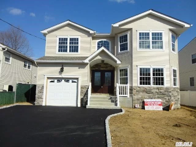 Gorgeous New Home On Deep Property Is Being Built. Quiet Part Of Bellmore Rd (No Double Yellow Lines). 3, 179 Sq Feet! Time To Customize! Interior Pics For Workmanship Purposes Only. Stunning Kit, Vanities, Granite, & Trimwork. Central & Convenient Location-- Close To All Major Parkways. Energy Efficient Top-Of-The-Line New Construction. Lowest-Priced Brand New Home Around!