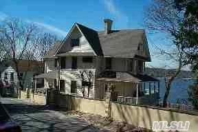 All Builders,  Investors,  Water-Lovers ~ Opportunity Knocks!! One Of A Kind,  Rare 4 Family In Mint Condition Overlooking L.I. Sound. Set On One Of Long Island's  Most Treasured Waterfront Properties. Breathtaking Panoramic Views From Everywhere. Magnificent Sunsets. *Need To Re-Build Retaining Wall*Being Sold As Is*