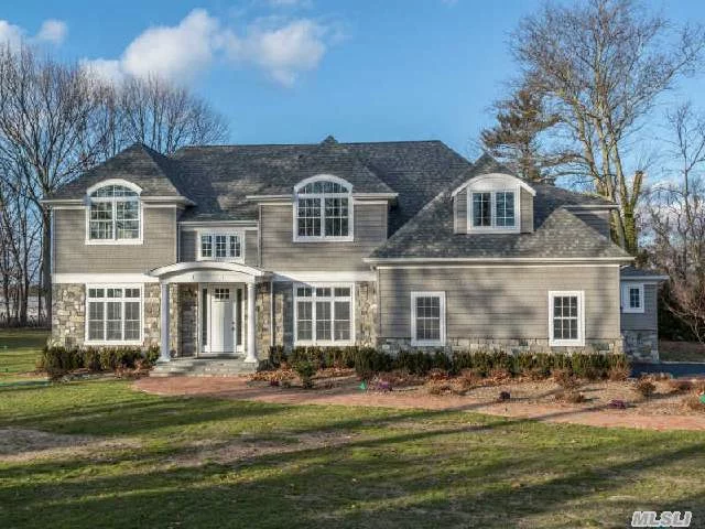 Magnificent Hampton Style, Stone Colonial. 6Brs, 4.5Bths On 1.48 Flat Acres In The Desirable Jericho Schools. Sprawling Entertaining Formal Rooms, Gourmet Kit W/Top Of The Line Appliances. This Home Exemplifies Quality, Architecture & Design. Conveniently Located To All. Robert Seaman Elem. & Jericho Ms.