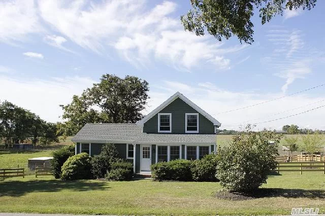 Quintessential Farmhouse Located In The Heart Of Cutchogue, Updated W/All Of The Modern Amenities. Home Is Absolutely Immaculate And Was Recently Renovated. Washer/Dryer In Basement, Plenty Of Dry Storage. 3 Beds W/Potential 4th Or Home Office. Entry Foyer/Mud Room In Rear W/Sun Room In Front Of Home.
