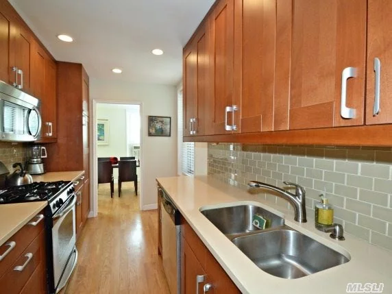 Totally Renovated Over Sized One Bedroom/Jr. 4-must See To Appreciate. Renovated Kitchen And Bathroom, (Which Was Made Larger) New Wood Floors Installed, Hi-Hats, .New Crown Moldings...Mint Condition! Great Location Express Bus To City Right Outside Your Door, Minutes To The Lirr.