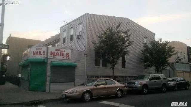 C1-4/R6B Zoning, One Block To Junction Blvd, Very Busy Location. Rent Income: Neil Store--$2500/M; 1st Fl--$1600/M; 2nd Fl--$1600/M.