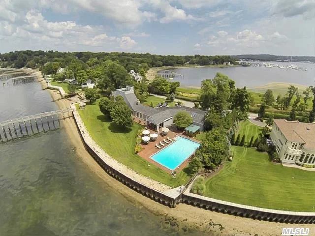 The Hampton&rsquo;s In Sands Point. Magical Waterfront Setting. 260 Feet Of Beachfront, Hypnotic Sunset Views. Overlooking Li Sound In Rear, And Manhasset Bay In The Front. Remodeled By Myron Goldfinger In 1986. 10 Rooms, All Facing Water. 3 Car Garage. Grandfathered Guest Cottage (Lr, , Br, Bath) W. 1.5 Car Attached Garage. Cabana, Pool, Bulkhead, Dock & Gazebo.