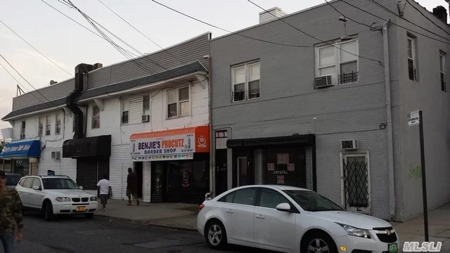 Excellent Investment Opportunity,  Large Corner Property,  Zoning C4-2. A Lot Of Potential Income. Prime Location,  Next To Subway Station. Owner Motivated.