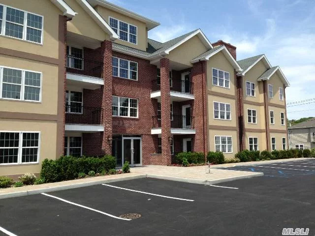 New Construction- Luxury Building - This 2 Bedroom Unit Features A Granite Kitchen With Stainless Steel Appliances, Wood And Tile Floors, Central Air, And A Balcony. 1 Car Underground Parking , Laundry Room , And Fitness Center. Pets Permitted With Extra Fee&rsquo;s .