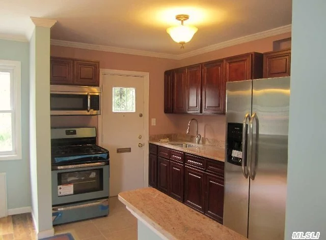 Totally Renovated.. New Stainless Steel Appliances.. Granite Counters.. Full Finished Basement..