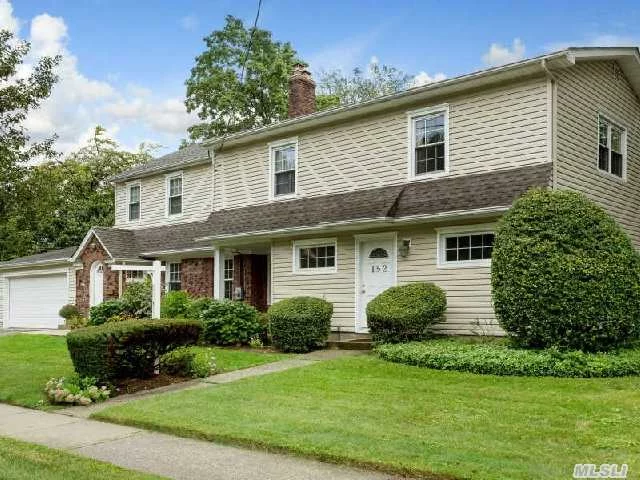 Four Bedroom Colonial, Updated Spacious Eat In Kitchen With Granite Counter Tops, Dining Area With Sliding Doors To Patio, Four Updated Baths,  Living Room With Fire Place . Additional Five Room Professional Space With Separate Entrance And Parking Space. Can Also Be Combined To Create Larger Living Space. The Options Are Endless.