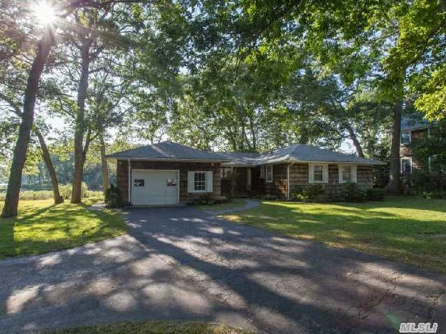 Boaters Ranch With Deeded Deep Water Dock, 3 Bedrooms, Hardwood Floors, Fireplace, Screened In Porch On Half Acre. Enjoy Endless 360 Degree Views Of Deep Hole Creek From The Screened In Porch Or Take Your Kayak Or Boat To Peconic Bay Just Around The Bend!