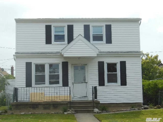 Beautiful Barnum Island 3 Bdrms 2 Full Baths With Wood Floors And Hook Up For A W/D Gas Heat And Cooking. Driveway And Fenced In Yard With Screened In Porch. Close To Lincoln Orens Middle School Lirr And T Of Hemp Shell Creek Park