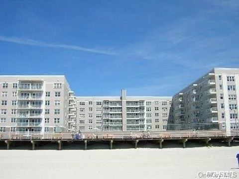 Beautiful Ocean Views,  Bright,  Cheerful,  Lg Jr.4 - 1 Bed,  Full Bath,  Terrace,  Sunken Lg. Lvg Rm,  Lg Ding Rm,   Kit,  Full-Bath,  Mirrored Closets Galore,  Extra Space For Office,  Easy  Convert To 2 Bedroom. Low Maint,  W/Parking. Luxury Building With Pool,  Gym,  Security,  Party Room,  Storage,  Bike Room,  Direct Access To Boardwalk. Come Live At The Beach!