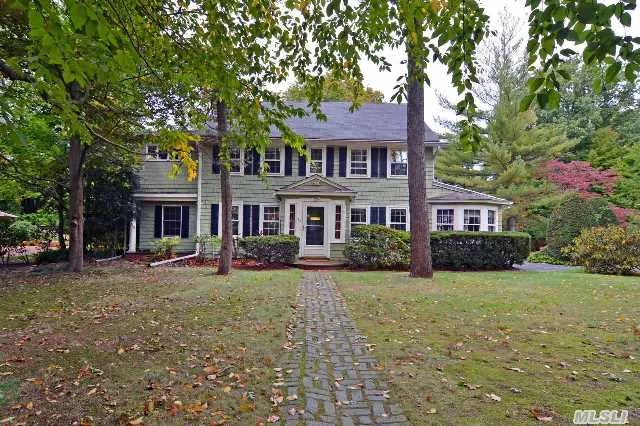 Traditional Center Hall Colonial On Huge Corner Property In Prime Port Washington Estates Neighborhood. The Highly Sought After Area Includes Beach And Mooring Rights On Manhasset Bay. Walk To Rr And Town. House Being Sold In As Is Condition.