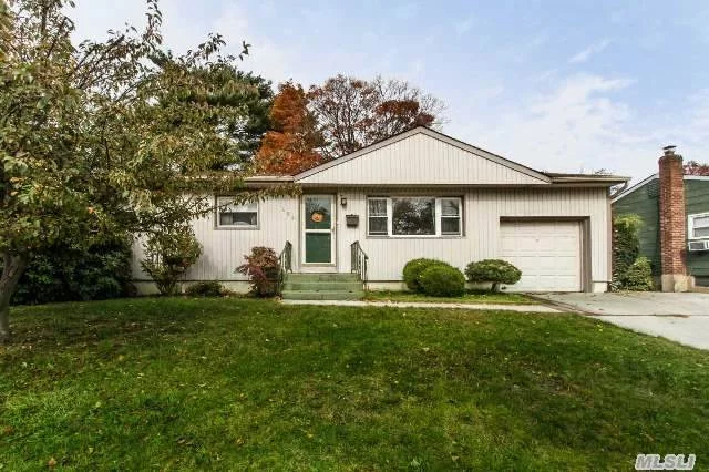 Wideline Ranch Features 3 Bedrooms, Extended Eat-In-Kitchen, Living Room, Dining Room, 1.5 Baths And A Full Basement,  Hardwood Floors, New Boiler And Oil Tank, 2 Car Driveway And Attached Garage. Oversized Property And Private Yard.