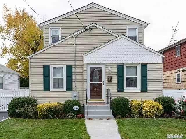 Here Is The Four Bedroom Colonial In The Carle Place Schools With A Full Basement And A Garage,  Featuring Hardwood Floors, 2 Full Baths, Central Air Conditioning, Updated Kitchen And Baths, Mid Block, 40X100 Property, A Must See !!! Please Come And Preview!!!