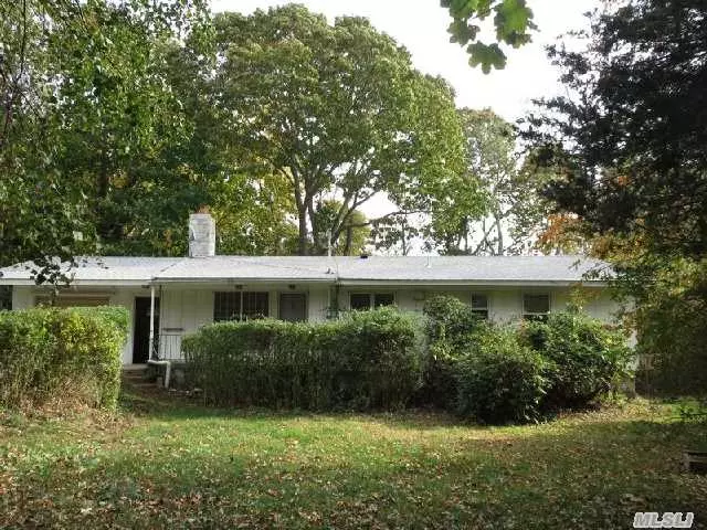 3 Bed, 1 Bath Ranch On Large Lot (.80 Acre) On Eastern Side Of Greenport. Hardwood Floors & Fireplace. Basement Has Large Entrance Doors To Back Yard. Best Value In Greenport. Adjacent .80 Acre Lot To East Is Included In The Sale.
