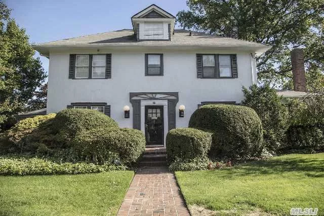 Outstanding, Stately 3 Bedroom, 2.5 Bath C/H Colonial On Quiet Street In Old Woodmere. Formal Living Room, Eik, Formal Dining Room, Den, Sunroom Overlooking Beautiful Garden, Master Br Suite. High Ceilings W/Beautiful Moldings. Additional 47X39 Lot.