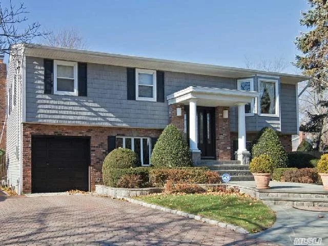 Perfect Location In Prime Bethpage Estates. Open Floor Plan, Living Room/ Dining Room With Cath Ceilng, Silders From Dining Room To Deck, Large Master W/Double Closets. New Main Bath, Hardwood Floors, Lower Level 4th Bedroom, Full Bath, Large Family Room W/Fireplace And Sliders To Private Fenced In Back Yard, Gas Cooking And Heat, Cac, Igs, Taxes Don&rsquo;t Reflect Star Of $1, 197.